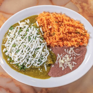 Enchiladas verdes with Mexican rice and refried beans at El Paisano Des Moines